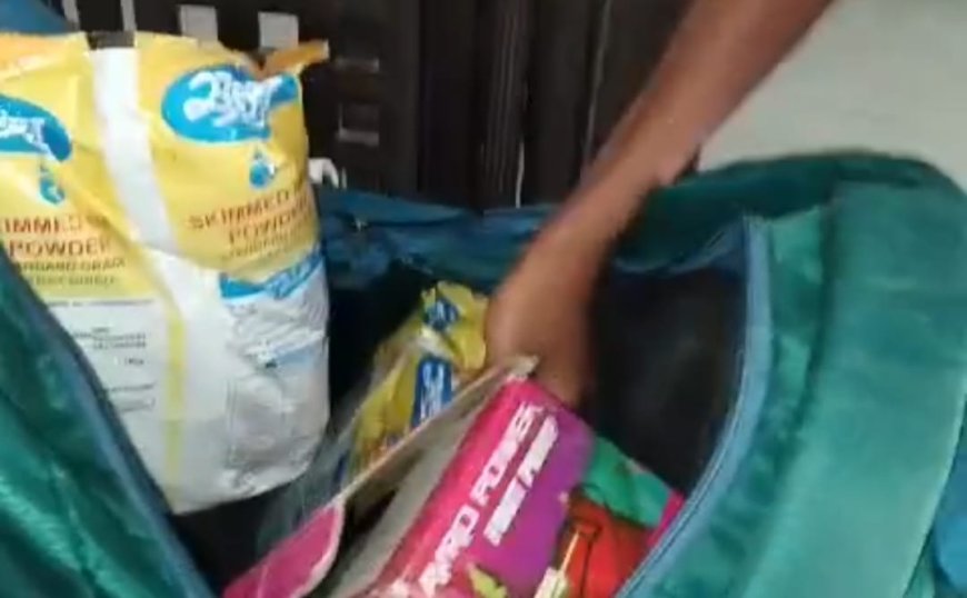 पोषाहार बनाने वाले को टोकना शिक्षक पर पड़ा भारी, मिल्क पाउडर ले जाने का वीडियो वायरल