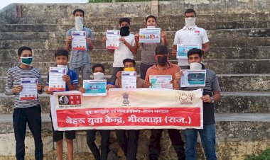 उपनगर पुर में नेहरू युवा केंद्र भीलवाड़ा जिला युवा समन्वयक और युवा एकता मंडलपुर  द्वारा कोरोना वायरस जागरूकता हेतु पोस्टर लगवाएं