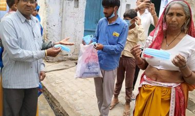कोराना के संक्रमण को नष्ट करने के लिए मास्क वितरित कर,  सैनेटाईजर  का छिड़काव करवाया
