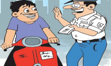 अनदेखी:- ट्रैफिक पुलिस ने सीट बेल्ट नहीं लगाने पर काटा बाइक सवार का चालान,
